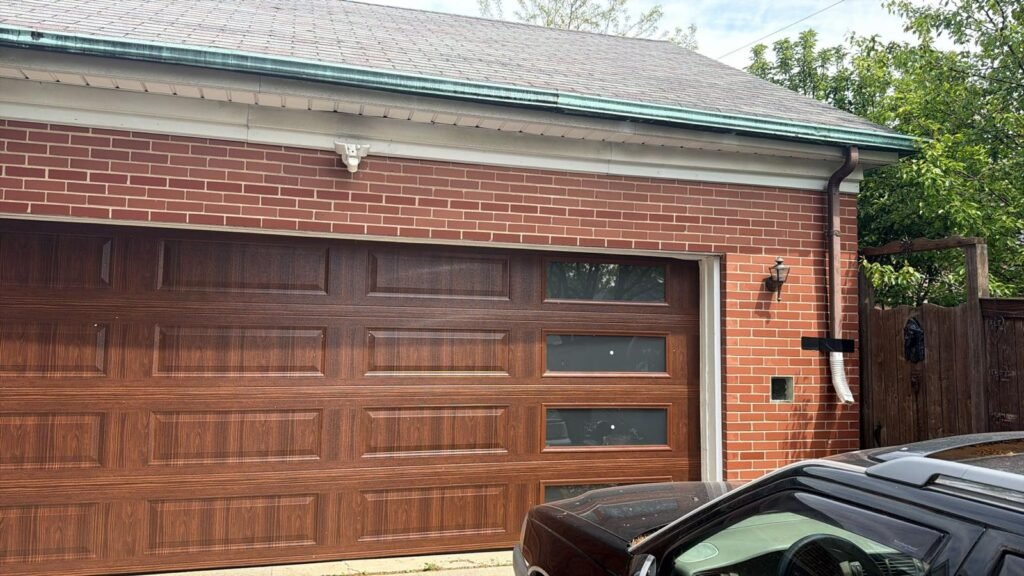 Traditional carriage-style garage door installed on a North Side Chicago brick home by Fairway Garage Door