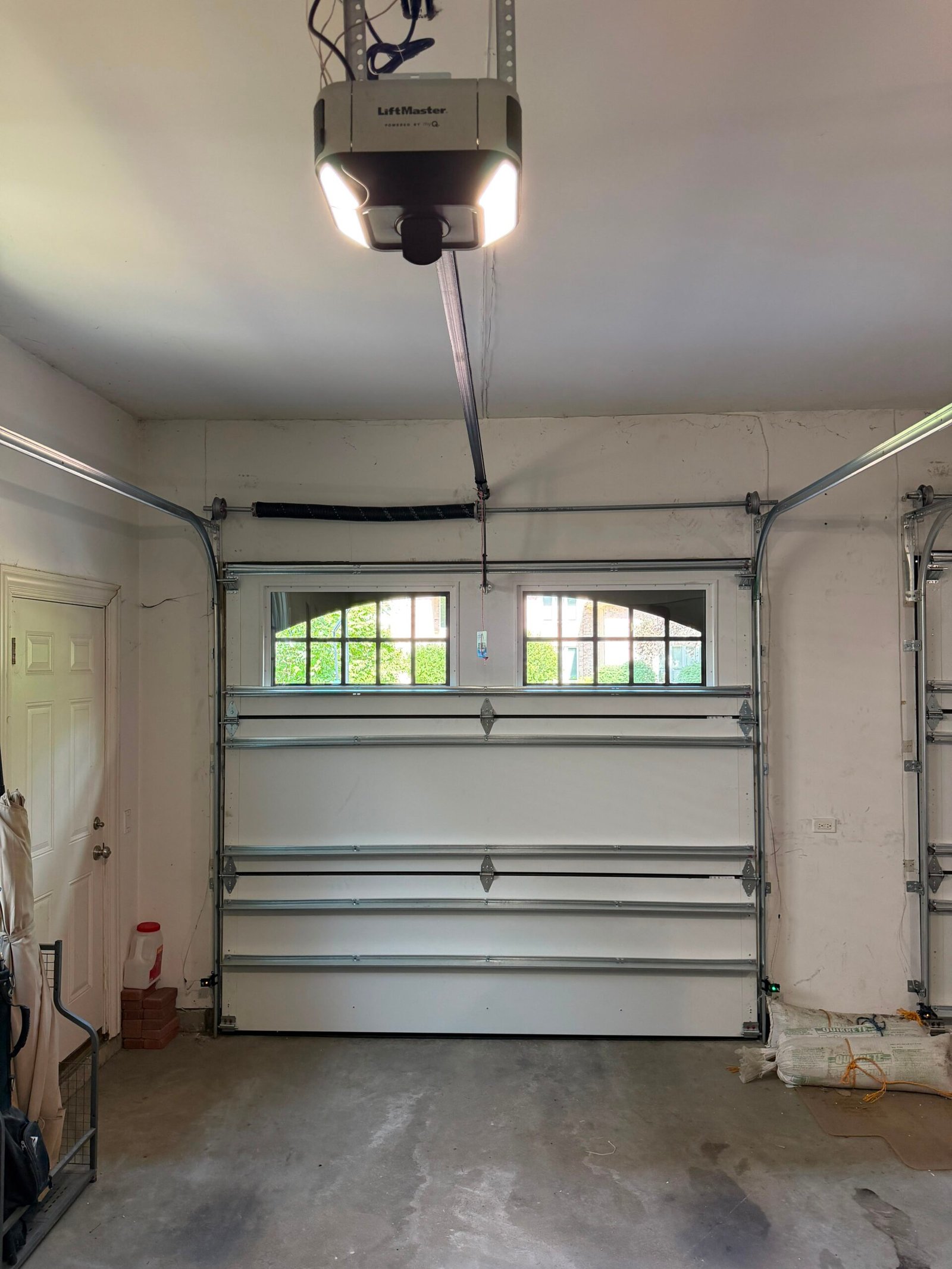 Emergency garage door service call in Chicago — Fairway Garage Door technician on the job