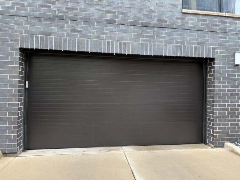 Why Your Garage Door is Frozen to the Ground (And How to Safely Open It)