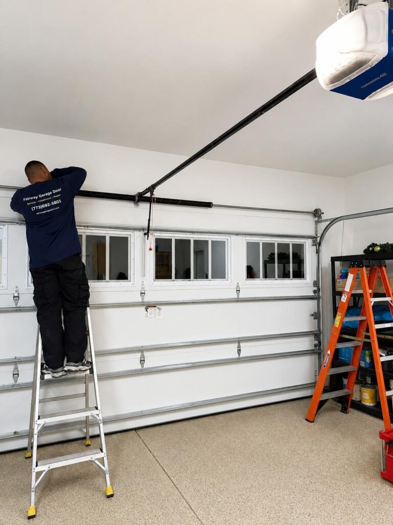 Fairway Garage Door technician diagnosing a noisy garage door spring on a residential door in Chicago