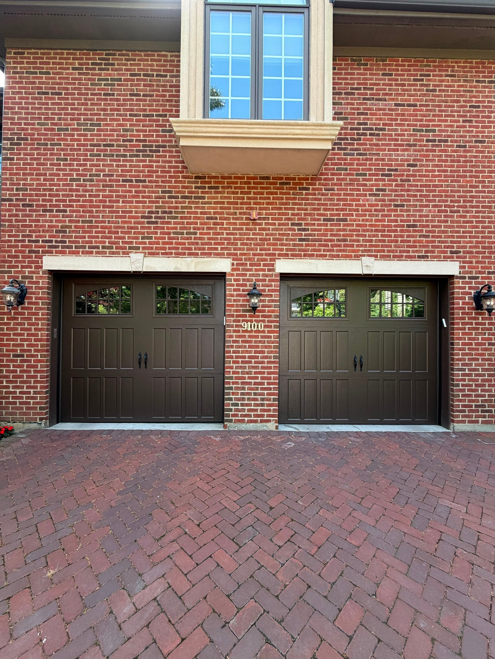 Double dark carriage doors with windows